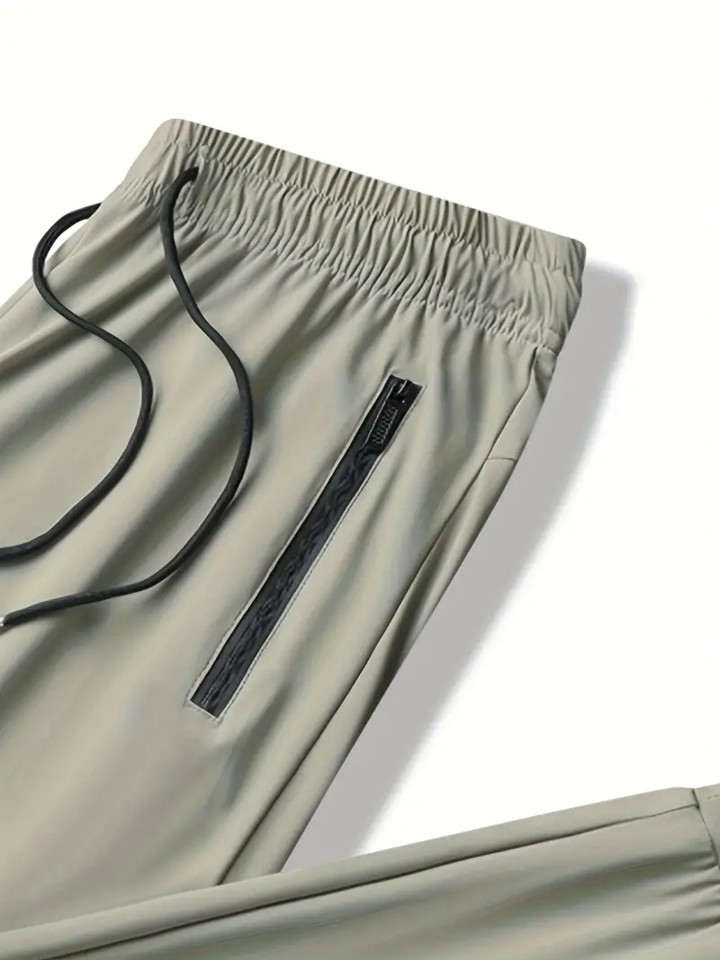 Pantalones deportivos de secado rápido transpirables preferidos para hombres 2024