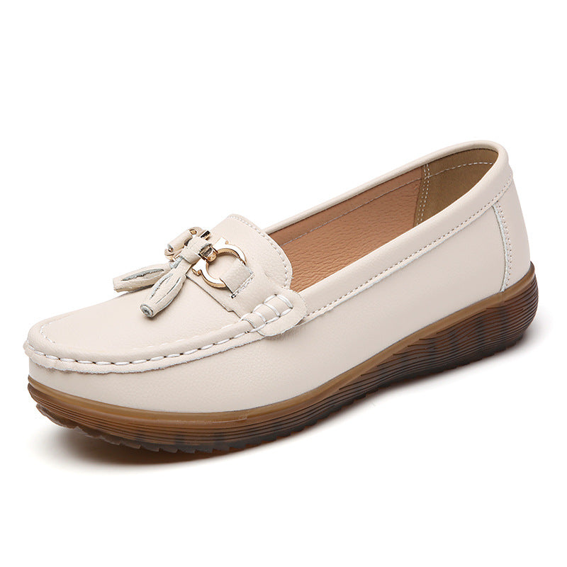 Mocasines planos decorados con borlas para mujer