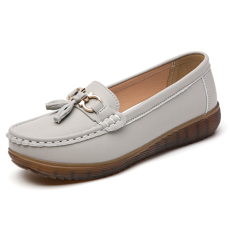 Mocasines planos decorados con borlas para mujer