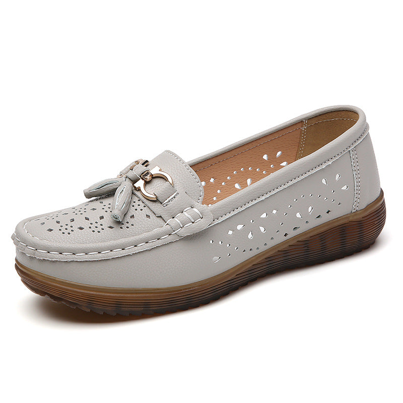 Mocasines planos decorados con borlas para mujer