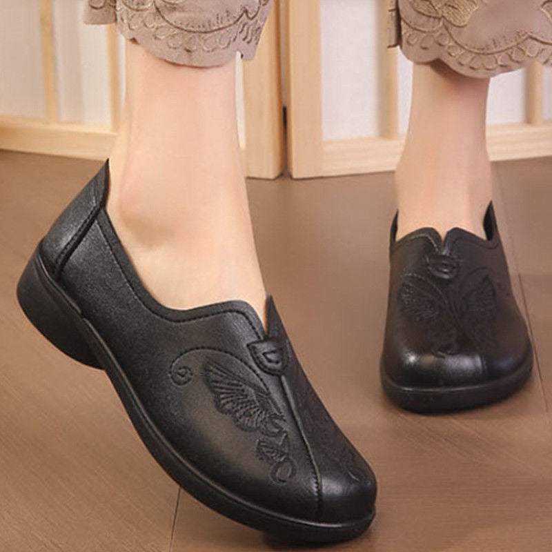 Zapatos planos bordados de piel auténtica