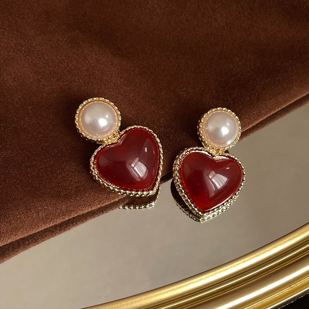 Hermosos aretes de piedras preciosas y perlas, compre uno y llévese otro gratis.