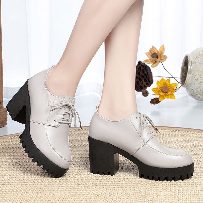 Primavera y otoño nuevos zapatos de mujer de piel blanda plataforma impermeable negra tacones altos y suelas gruesas 2025