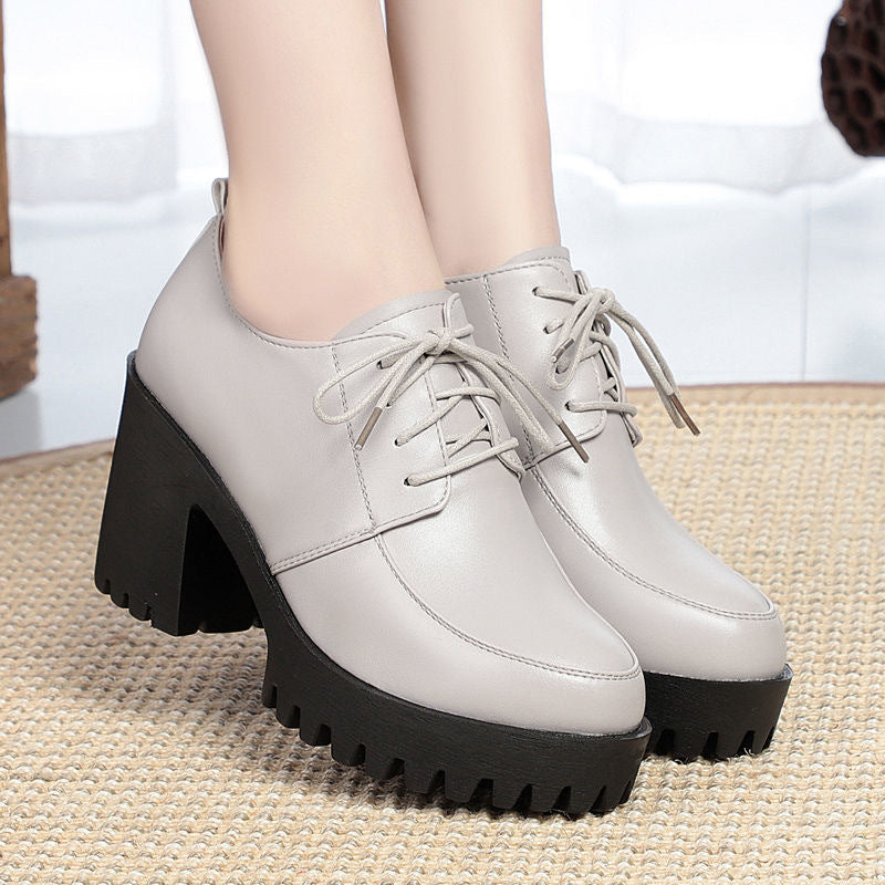 Primavera y otoño nuevos zapatos de mujer de piel blanda plataforma impermeable negra tacones altos y suelas gruesas 2025
