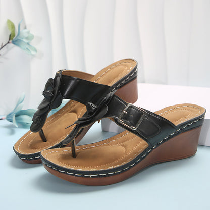 Sandalias con decoración floral para mujer