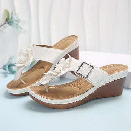 Sandalias con decoración floral para mujer
