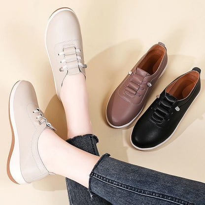 Zapatos de cuero de suela blanda sin cordones