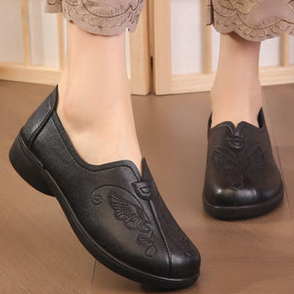 Zapatos planos bordados de piel auténtica