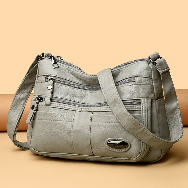 Bolso de piel con cuentas ovaladas