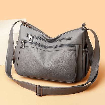 Bolso de piel con estampado de rosas