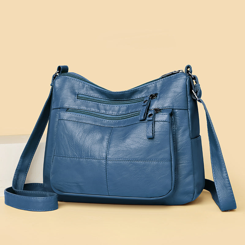 Bolso bandolera de piel suave a cuadros