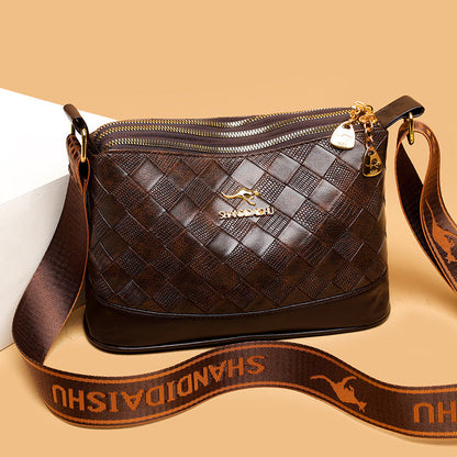 Bolso bandolera de piel suave con estampado de rombos