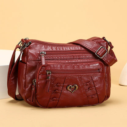 Bolso de piel práctico e informal con múltiples bolsillos