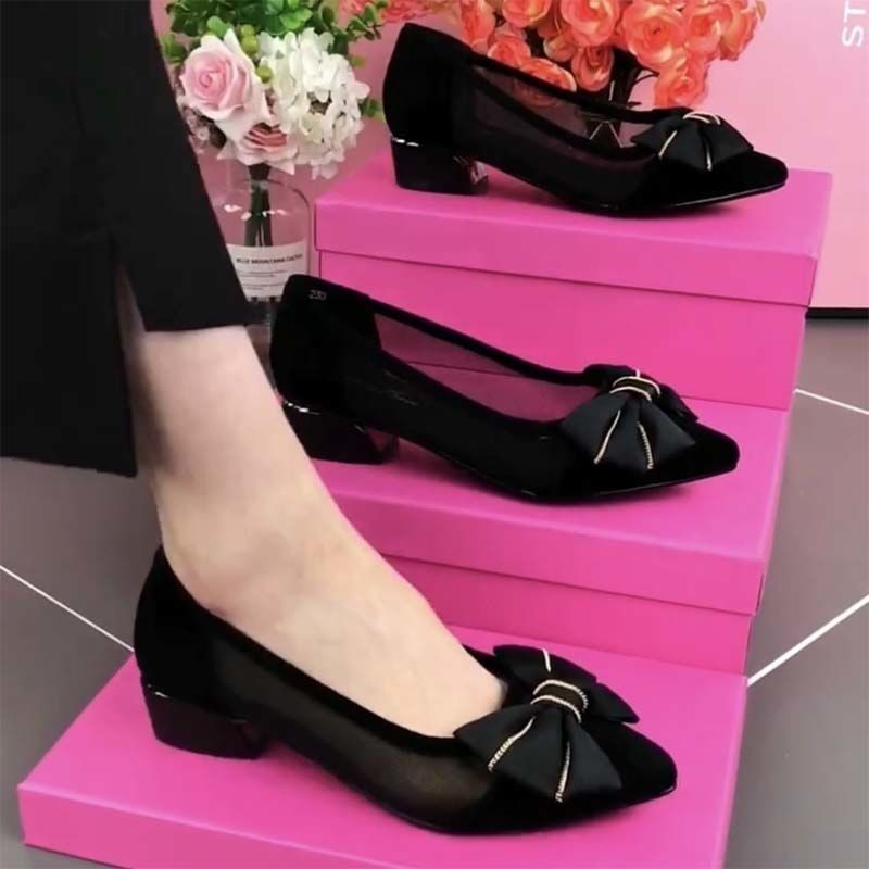 Nuevos zapatos individuales femeninos huecos con lazo en primavera y verano