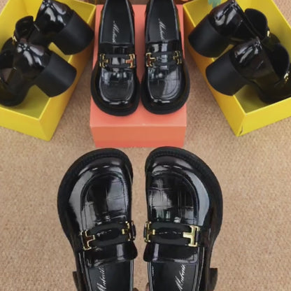 Zapatos de piel con etiqueta T